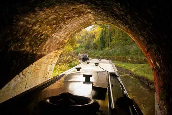 Moored narrowboats in the picturesque village of Lymm